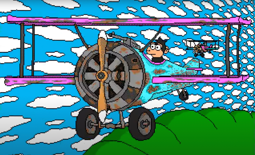 Still frame from Turd Eating Cat: a monkey flying a cyan plane is being
chased by a cat in a magenta plane